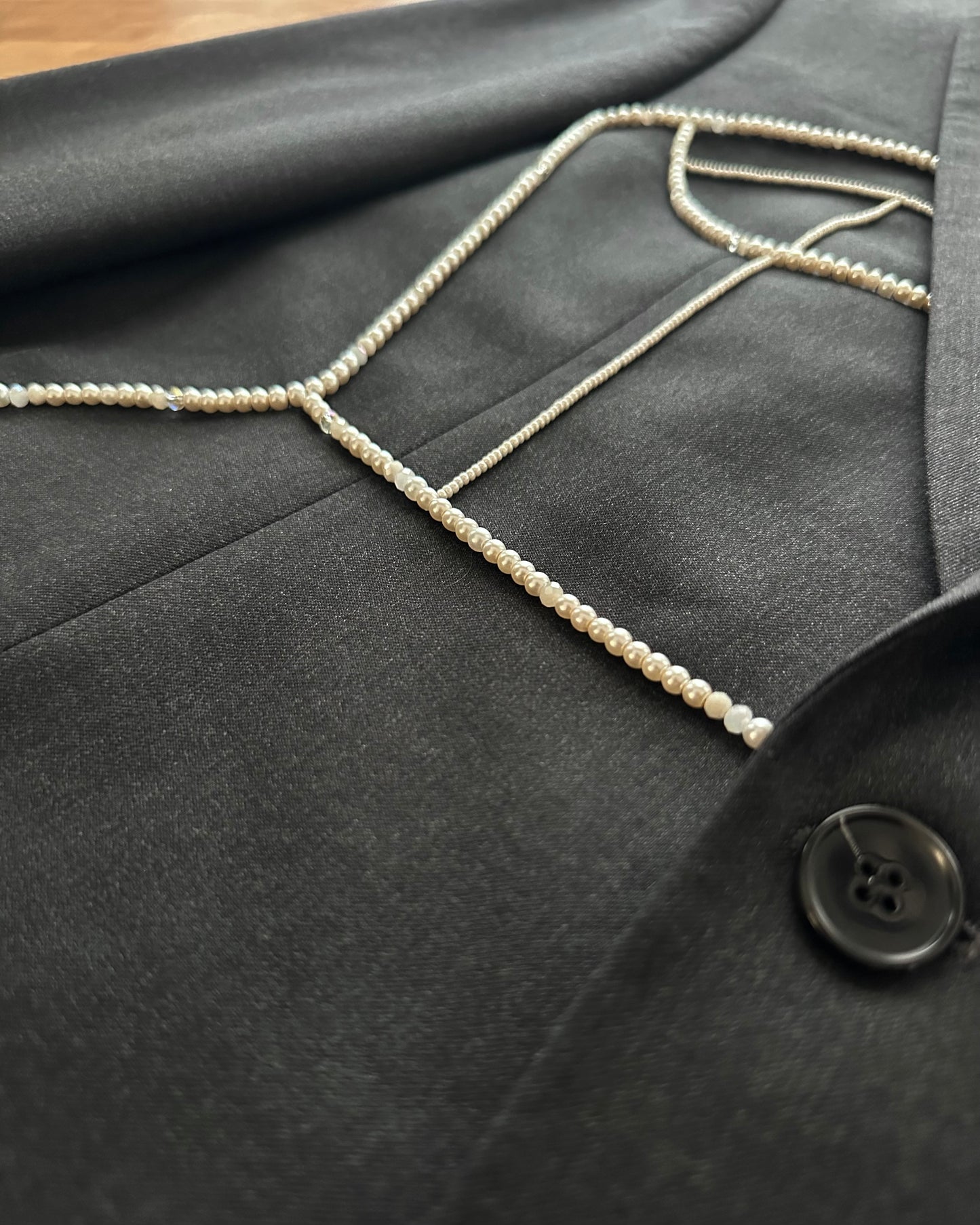 GRAY WOOL BLAZER WITH HAND-BEADED CORSET DESIGN