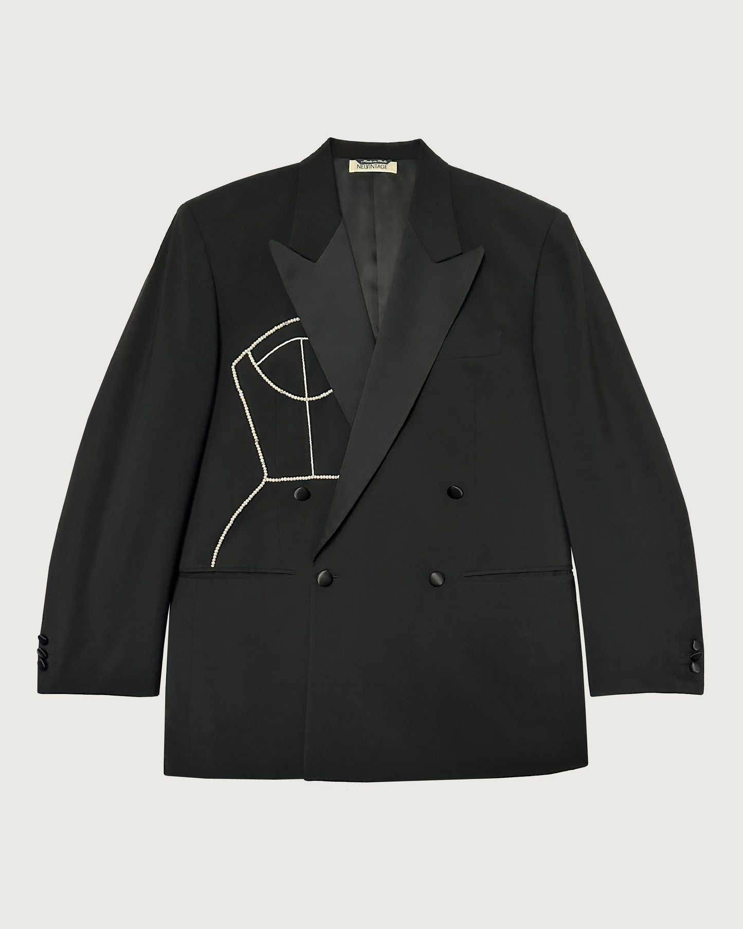 Double-breasted wool tuxedo with hand-beaded corset design