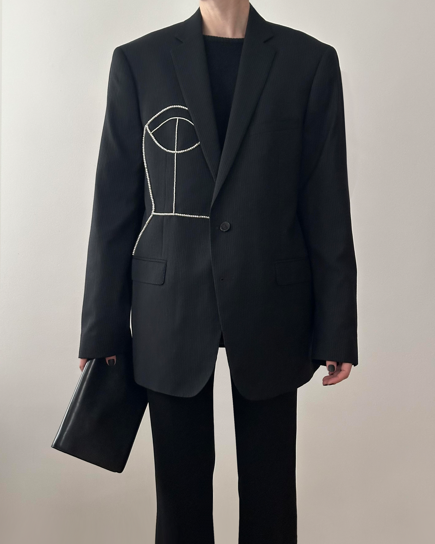 BLACK PINSTRIPE WOOL BLAZER WITH HAND-BEADED CORSET DESIGN