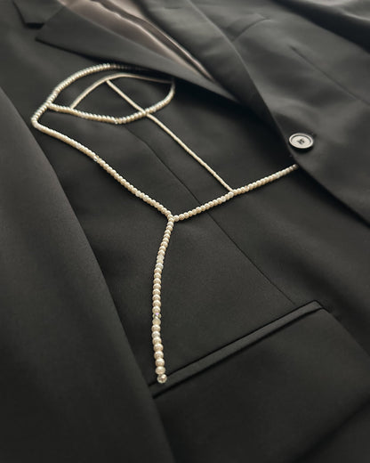 BLACK WOOL BLAZER WITH HAND-BEADED CORSET DESIGN