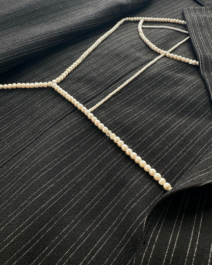 BLACK PINSTRIPE WOOL BLAZER WITH HAND-BEADED CORSET DESIGN