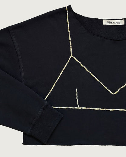 Upcycled oversized cropped sweatshirt with hand beaded bra